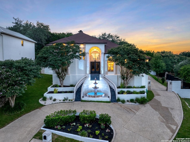 3 Benchwood Cir, San Antonio, TX 78248 - view of front of home featuring french doors, stucco siding, curved driveway, and stairway