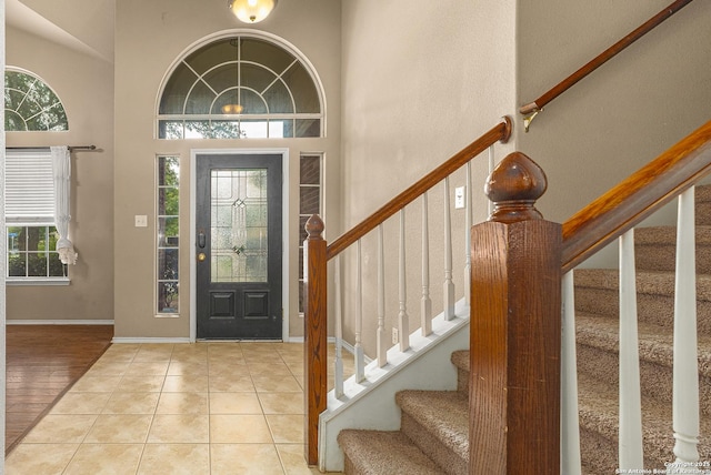 6218 Ozona Ml, San Antonio, TX 78253 - foyer entrance with stairs, a high ceiling, and baseboards