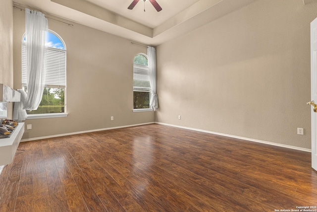 6218 Ozona Ml, San Antonio, TX 78253 - empty room featuring wood finished floors, healthy amount of natural light, and ceiling fan