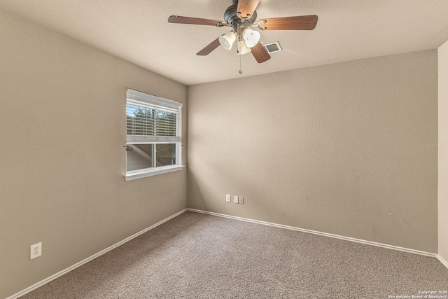 6218 Ozona Ml, San Antonio, TX 78253 - spare room featuring carpet, a ceiling fan, and baseboards