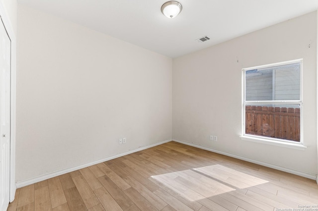 7619 Bit Cir, Elmendorf, TX 78112 - empty room with wood finished floors and baseboards