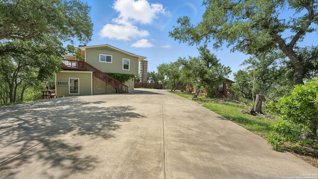 1001 Naked Indian, New Braunfels, TX 78132 - view of front of home featuring stairs and concrete driveway