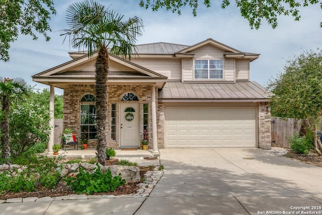 8227 Maloy Mnr, San Antonio, TX 78250 - view of front of house featuring brick siding, concrete driveway, a garage, metal roof, and a porch