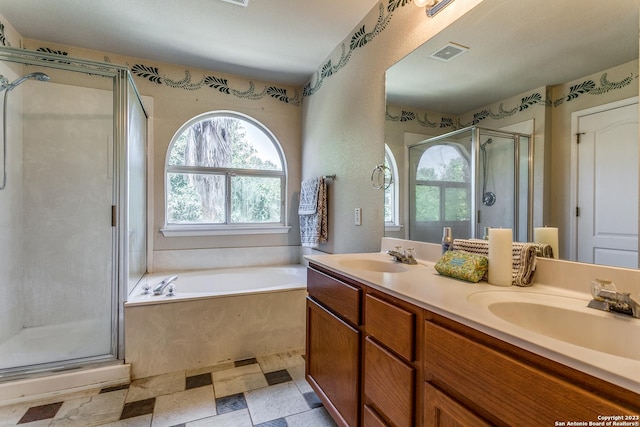 8227 Maloy Mnr, San Antonio, TX 78250 - bathroom featuring a stall shower, a bath, and double vanity