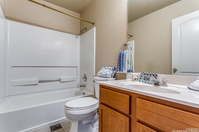 8227 Maloy Mnr, San Antonio, TX 78250 - full bath featuring vanity, bathtub / shower combination, toilet, a textured wall, and tile patterned flooring