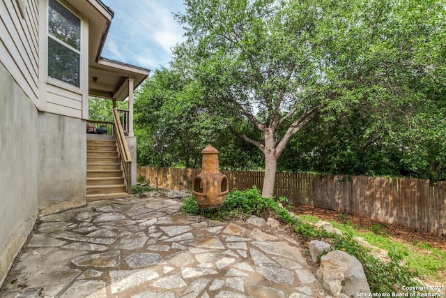 8227 Maloy Mnr, San Antonio, TX 78250 - view of patio / terrace featuring stairway