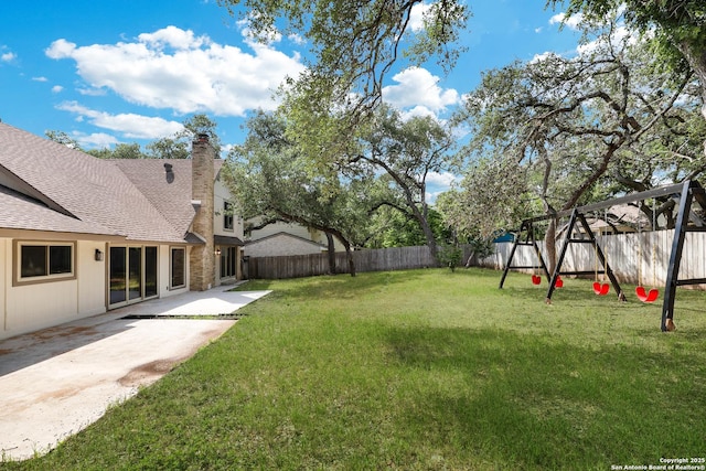 5411 Lancashire, San Antonio, TX 78230 - view of yard with a playground and a patio