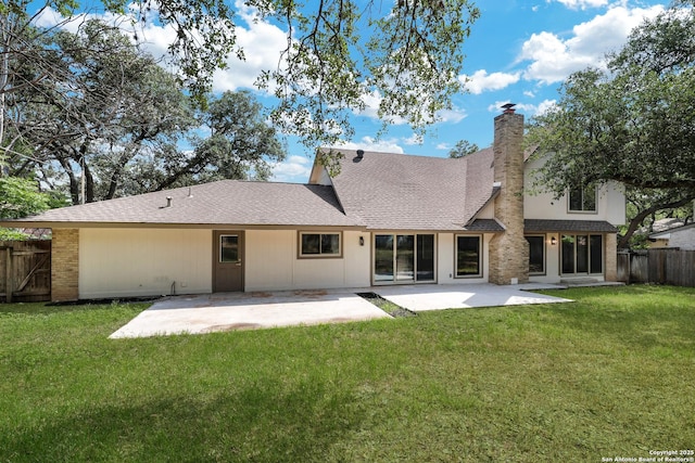 5411 Lancashire, San Antonio, TX 78230 - back of house with a shingled roof, a patio area, and a chimney