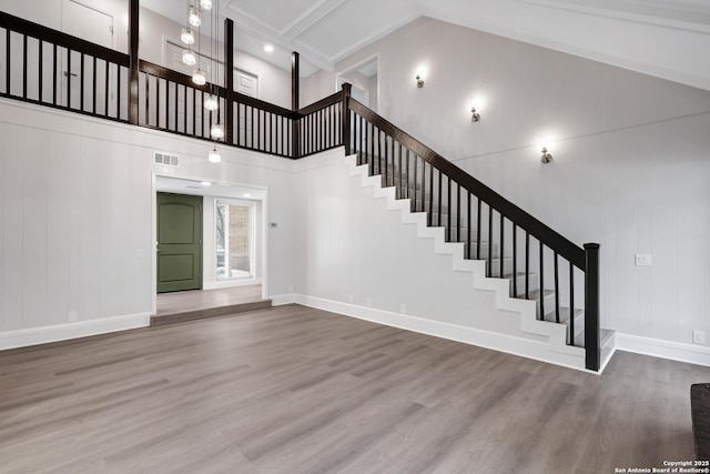 5411 Lancashire, San Antonio, TX 78230 - stairway featuring high vaulted ceiling, wood finished floors, baseboards, and beam ceiling