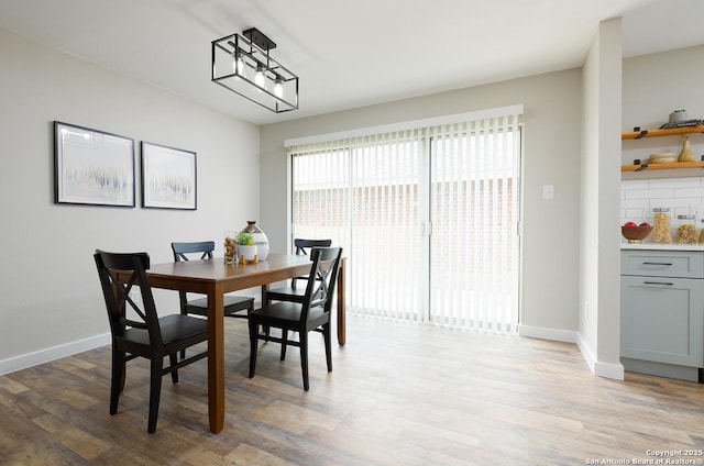 11375 Olney Spgs, San Antonio, TX 78245 - dining space with light wood-type flooring and baseboards