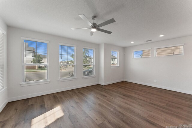9607 Stillwater Pass, San Antonio, TX 78254 - unfurnished room featuring wood finished floors, baseboards, ceiling fan, recessed lighting, and a textured ceiling