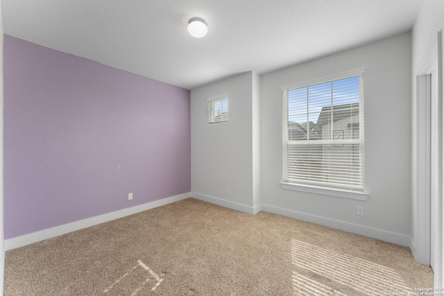 9607 Stillwater Pass, San Antonio, TX 78254 - empty room featuring carpet floors and baseboards