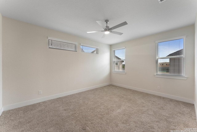 9607 Stillwater Pass, San Antonio, TX 78254 - empty room with light colored carpet, ceiling fan, and baseboards