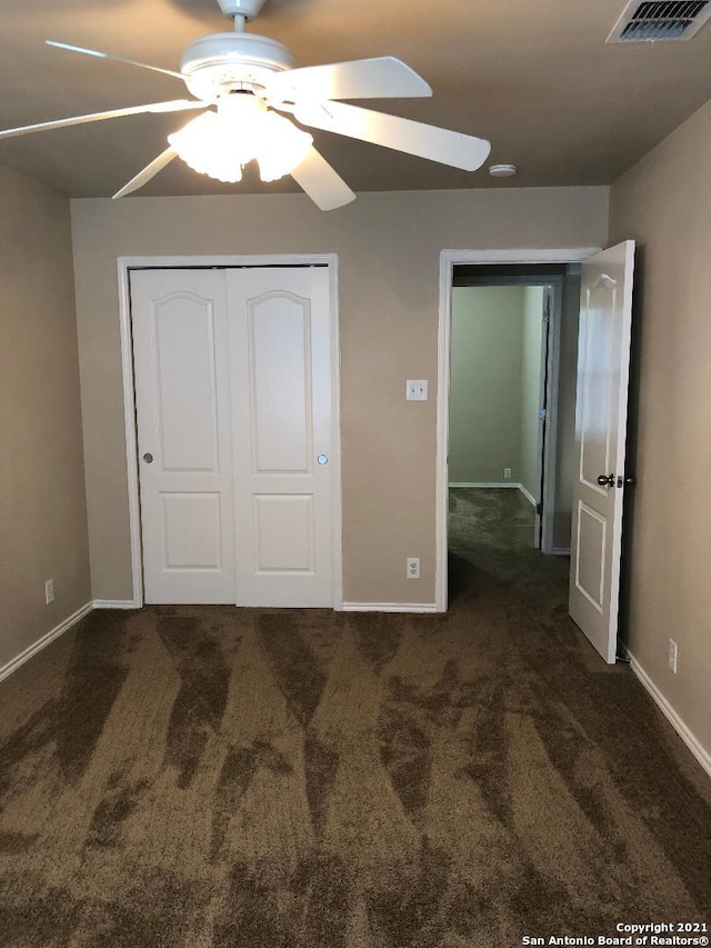5514 Justin, San Antonio, TX 78240 - unfurnished bedroom featuring carpet, a closet, baseboards, and ceiling fan