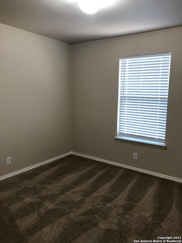 5514 Justin, San Antonio, TX 78240 - carpeted spare room featuring baseboards