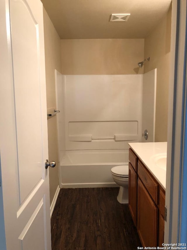 5514 Justin, San Antonio, TX 78240 - full bath with wood finished floors, vanity, toilet, and shower / bath combination