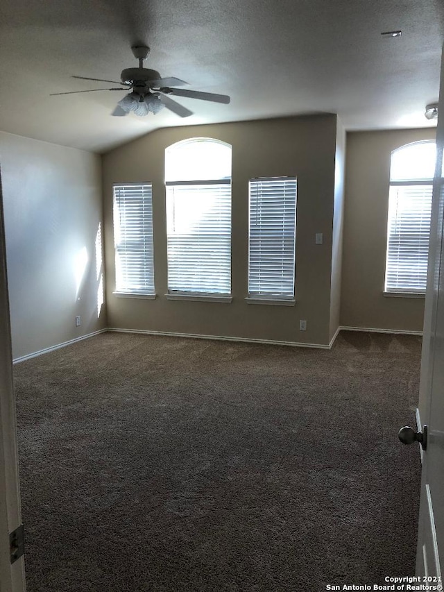 5514 Justin, San Antonio, TX 78240 - carpeted spare room with a ceiling fan, baseboards, and vaulted ceiling