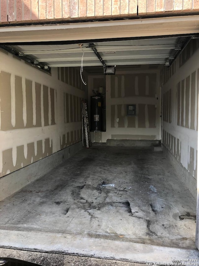 5514 Justin, San Antonio, TX 78240 - garage featuring water heater and electric panel