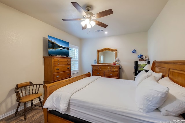 246 Felisa St, San Antonio, TX 78210 - bedroom with wood finished floors, ceiling fan, and baseboards