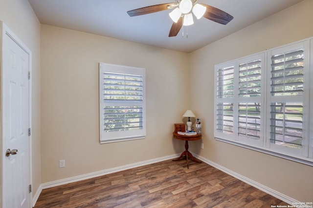 246 Felisa St, San Antonio, TX 78210 - unfurnished room with plenty of natural light, wood finished floors, and baseboards