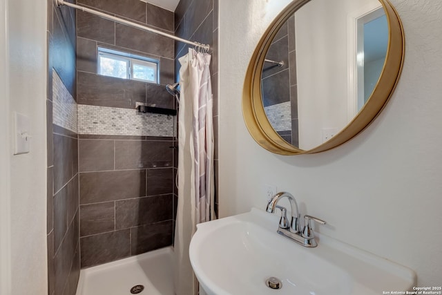 246 Felisa St, San Antonio, TX 78210 - full bathroom with a sink and tiled shower