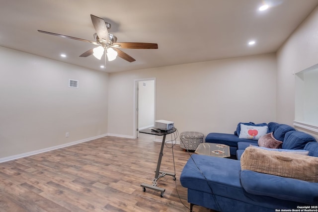 246 Felisa St, San Antonio, TX 78210 - living area featuring recessed lighting, a ceiling fan, light wood-style flooring, and baseboards