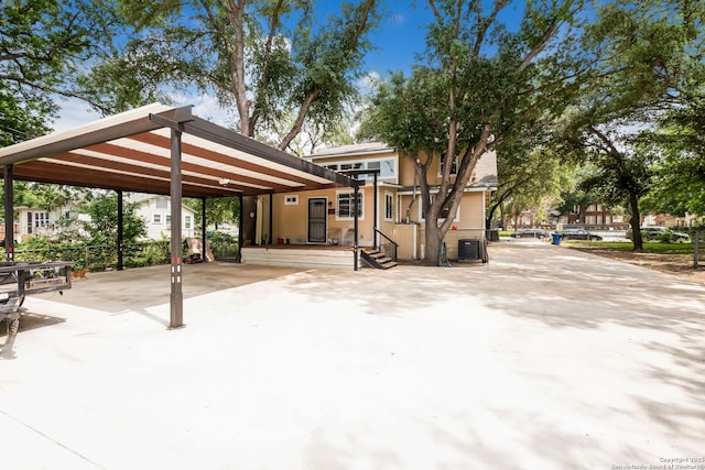 246 Felisa St, San Antonio, TX 78210 - exterior space featuring a carport and driveway