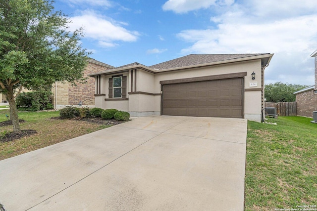 124 Mary Max Cir, San Marcos, TX 78666 - prairie-style house with a garage, stucco siding, concrete driveway, and central AC unit
