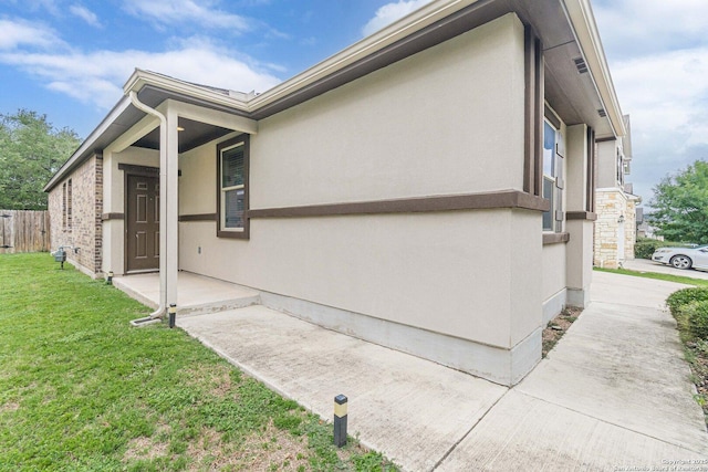 124 Mary Max Cir, San Marcos, TX 78666 - view of property exterior featuring stucco siding