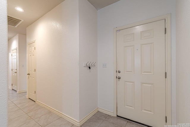 124 Mary Max Cir, San Marcos, TX 78666 - entryway featuring light tile patterned floors and baseboards