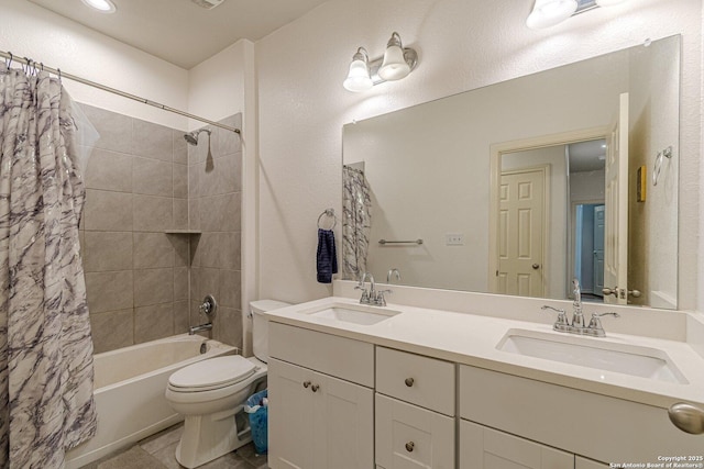 124 Mary Max Cir, San Marcos, TX 78666 - bathroom featuring double vanity, shower / bath combo, and toilet