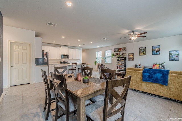 124 Mary Max Cir, San Marcos, TX 78666 - dining area with light tile patterned floors, a ceiling fan, and recessed lighting
