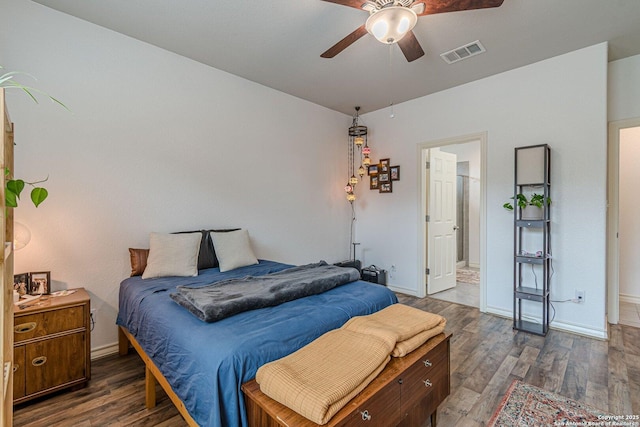 124 Mary Max Cir, San Marcos, TX 78666 - bedroom with wood finished floors, baseboards, ensuite bath, and ceiling fan
