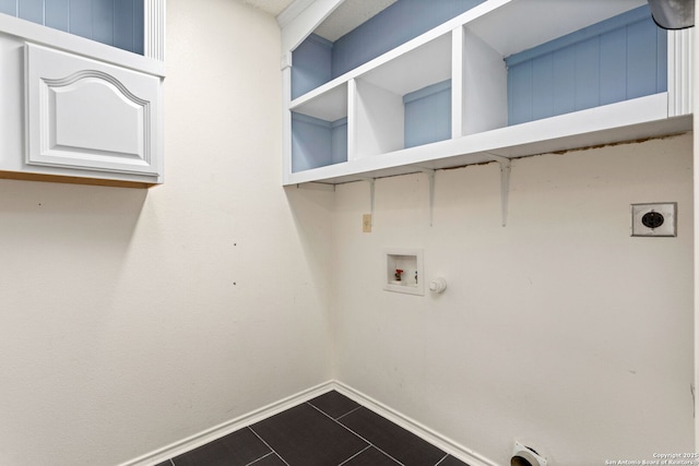 18718 Legend Oaks, San Antonio, TX 78259 - laundry area featuring electric dryer hookup, hookup for a washing machine, baseboards, hookup for a gas dryer, and dark tile patterned floors