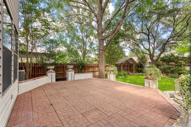 18718 Legend Oaks, San Antonio, TX 78259 - fenced backyard with a patio area and central air condition unit