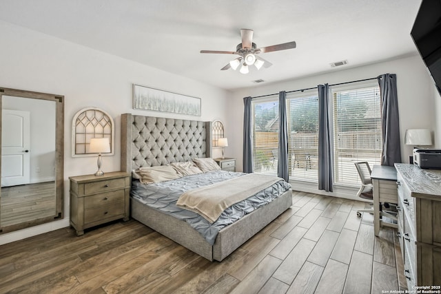 14042 Gemma, San Antonio, TX 78253 - bedroom featuring wood finished floors, an office area, baseboards, and ceiling fan