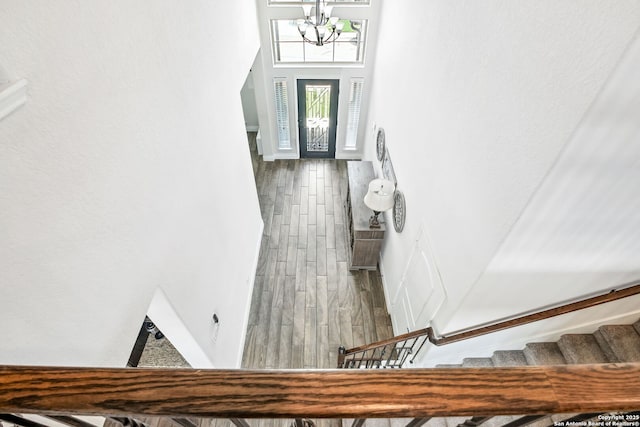 14042 Gemma, San Antonio, TX 78253 - foyer with wood finished floors, a chandelier, stairway, and a towering ceiling