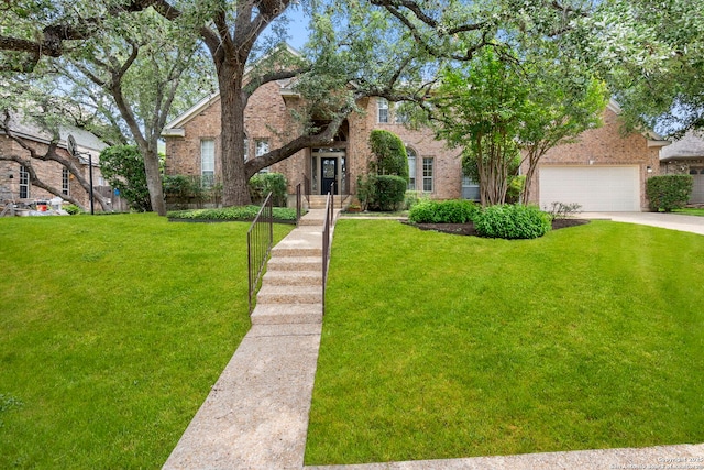 15618 Dawn Crst, San Antonio, TX 78248 - view of front of home featuring brick siding, a front lawn, driveway, and a garage