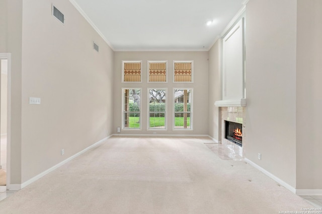 15618 Dawn Crst, San Antonio, TX 78248 - unfurnished living room featuring a premium fireplace, crown molding, light colored carpet, and baseboards