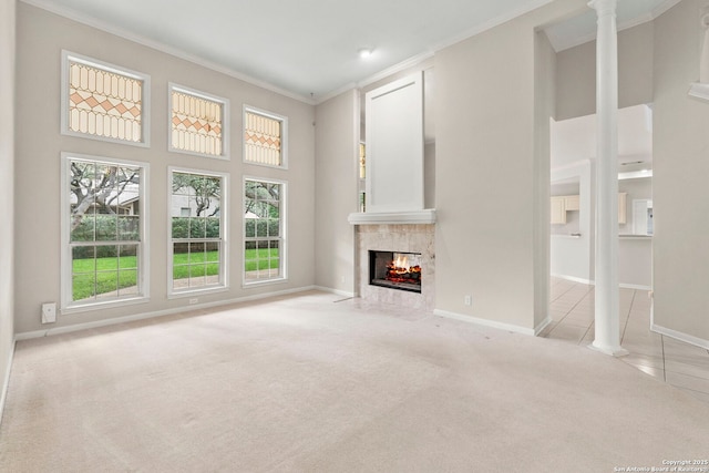 15618 Dawn Crst, San Antonio, TX 78248 - unfurnished living room with ornamental molding, a tile fireplace, light colored carpet, a high ceiling, and baseboards