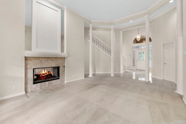 15618 Dawn Crst, San Antonio, TX 78248 - entrance foyer with carpet flooring, a tiled fireplace, crown molding, recessed lighting, and baseboards