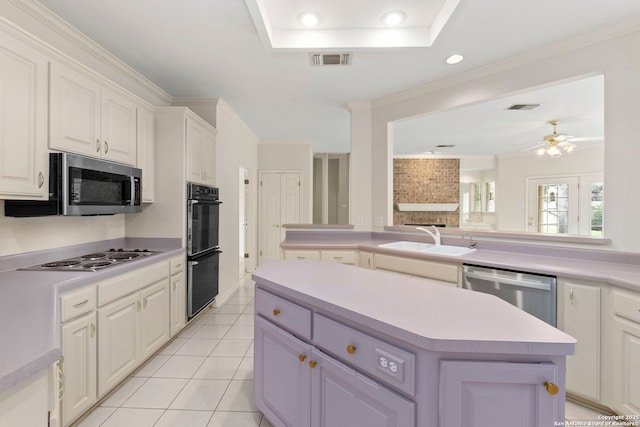 15618 Dawn Crst, San Antonio, TX 78248 - kitchen with a sink, appliances with stainless steel finishes, a center island, light countertops, and recessed lighting