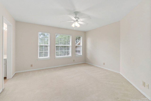 15618 Dawn Crst, San Antonio, TX 78248 - spare room with ceiling fan, light carpet, and baseboards