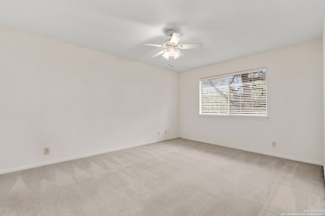 15618 Dawn Crst, San Antonio, TX 78248 - spare room featuring light carpet, a ceiling fan, and baseboards