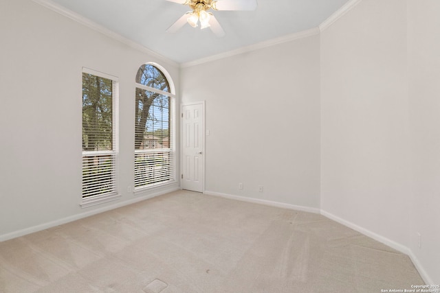15618 Dawn Crst, San Antonio, TX 78248 - spare room featuring light colored carpet, crown molding, baseboards, and a ceiling fan