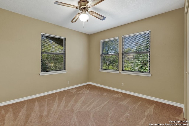 642 Lakebreeze, Canyon Lake, TX 78133 - carpeted spare room featuring baseboards and a ceiling fan