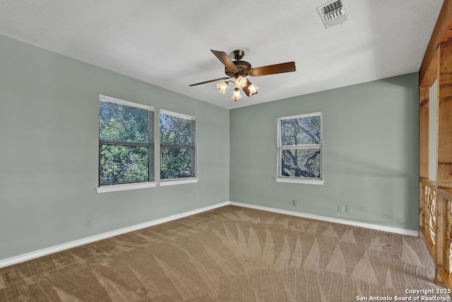 642 Lakebreeze, Canyon Lake, TX 78133 - unfurnished room featuring carpet floors and a ceiling fan