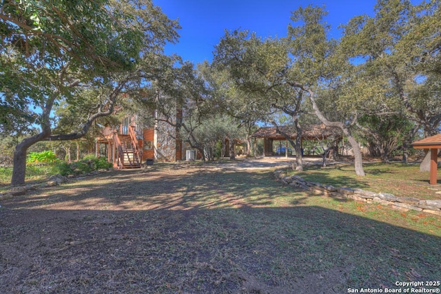 642 Lakebreeze, Canyon Lake, TX 78133 - view of green lawn with a gazebo