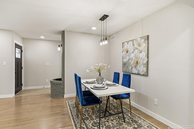 207 Northaven, San Antonio, TX 78229 - dining room with light wood-type flooring, recessed lighting, and baseboards