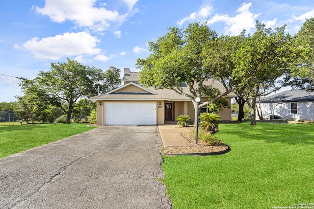 890 Live Oak, Spring Branch, TX 78070 - view of front of property featuring asphalt driveway, an attached garage, stucco siding, and roof with shingles